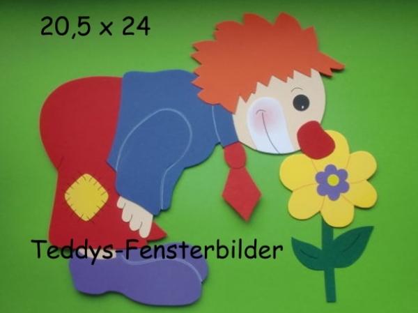 Clown riecht an Blume